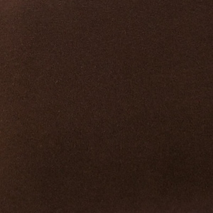 May include: A solid brown fabric with a smooth texture.