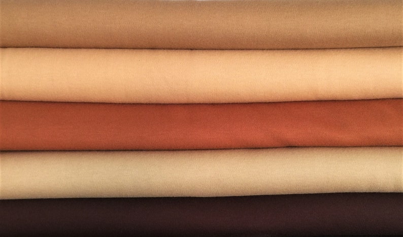 May include: Five fabric swatches in different shades of brown, from light beige to dark brown.