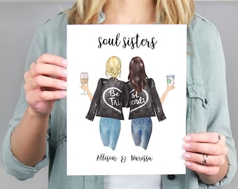 Puede incluir: Una tarjeta blanca con una ilustración de acuarela de dos mujeres que llevan chaquetas de cuero negro con el texto "Soul Sisters" en la parte superior. Las mujeres sostienen una copa de vino y una taza de café. El texto "Be This" y "Best Friends" está en la parte posterior de sus chaquetas. El texto "Allison & Marissa" está en la parte inferior de la tarjeta.