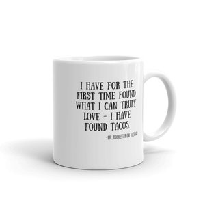 May include: White ceramic coffee mug with black text that reads "I have for the first time found what I can truly love - I have found tacos. -Mr. Rochester on Tuesday"