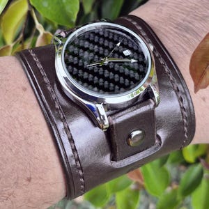 Handcrafted Leather Steampunk Wristwatch, Leather Cuff Watch my creation of a handmade leather strap with a handmade Black Carbon Holo dial.
