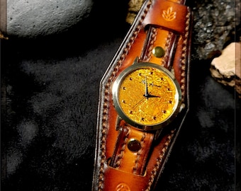 Leather Cuff Watch, my creation of a handmade leather strap with a handmade dial.