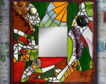 Mosaic mirror made with Tiffany glass, amethysts, golden agates, Mother of Perl, Professional Modeling Putty