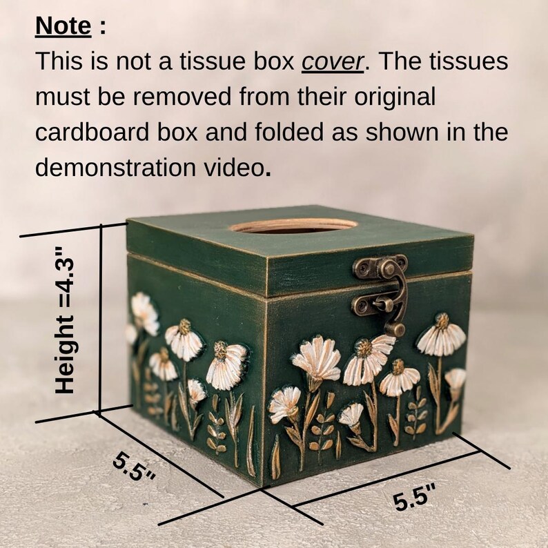May include: A dark green wooden tissue box with a floral design. The box is 5.5 inches wide and 4.3 inches high. It features a hinged lid and a decorative floral relief. The text on the image says: "This is not a tissue box cover."