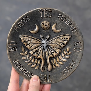 Luna moth pendulum board