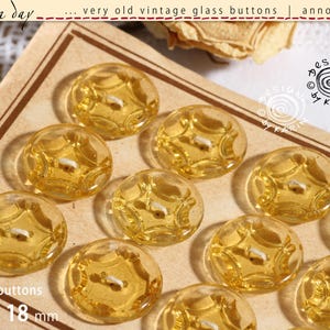 12 botones de cristal antiguos vintage de 1940 - cristal transparente amarillo sobre cartón original - diseño de estrella - ø cada uno aprox. 18 mm - N.º 765