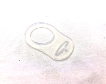 Silicone ring as adapter for pacifiers without handle