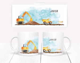 May include: Two white ceramic mugs with a watercolor design of construction vehicles. One mug features an excavator and the other a dump truck. Both mugs have the name "JAKOB" printed on them.