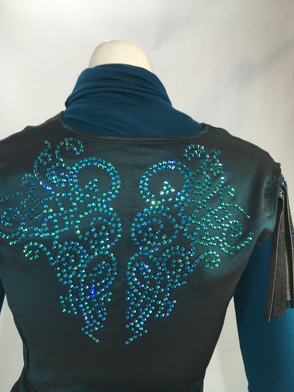 turquoise vest and tie