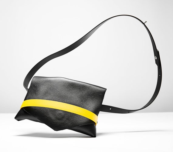 black bag with yellow strap