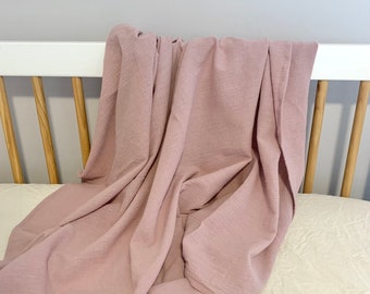 Dusty pink baby swaddle wrap