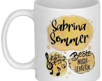 May include: White ceramic mug featuring the name "Sabrina Sommer" in black script over a yellow watercolor-style background. The mug also includes musical notes and the text "Beste Musiklehrerin."