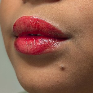 holiday lip gloss a deep cherry red