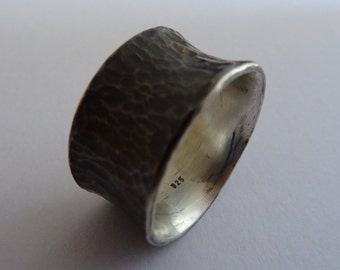 Wide Silver ring blackened, concave hammered.
