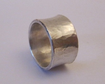 14 mm wide silver ring, concave hammered.