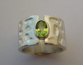 Wide silver ring with real peridot 7 x 5 mm