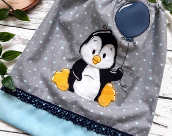 Embroidery file penguin balloon