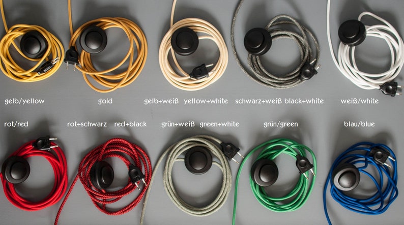 May include: Assortment of 10 colors of electrical cords with in-line switches. The cords are coiled and feature a variety of colors including yellow, gold, white, black, red, green, and blue.