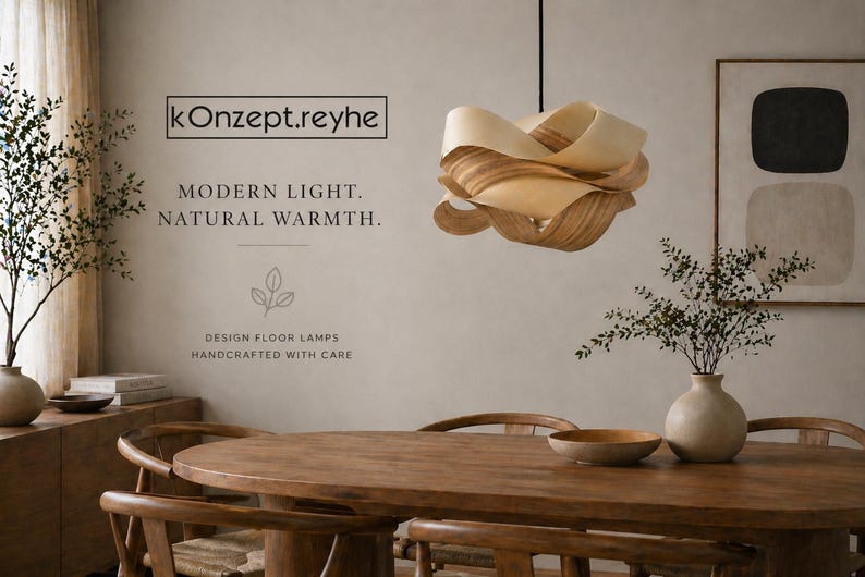 May include: A modern, wooden pendant light hangs above a wooden dining table. The light fixture is made of layered, light-colored wood. The room features a neutral color palette with a vase of greenery and the text "kOnzept.reyhe".