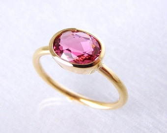 roze toermalijn ring van 750 goud, breedte 58,5, verlovingsring roze steen, uniek stuk