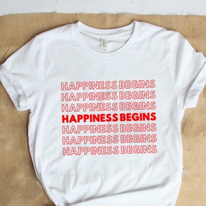 J.b happiness begins Unisex T-Shirt