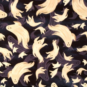 May include: A repeating pattern of whimsical, cream-colored ghosts on a dark blue background. The ghosts vary in size and pose, with some appearing to float and others with outstretched arms. The design has a hand-painted aesthetic, perfect for Halloween-themed products.