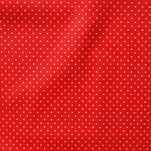 Könnte beinhalten: Roter Stoff mit weißen Punkten.