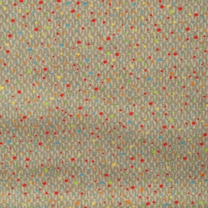 Puede incluir: Una tela beige con un patrón repetitivo de pequeños puntos de colores. Los puntos son rojos, azules, amarillos y verdes.