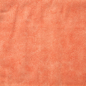 Könnte beinhalten: Nahaufnahme eines strukturierten orangefarbenen Stoffes mit einem sich wiederholenden Muster aus kleinen Kreisen und Sechsecken.