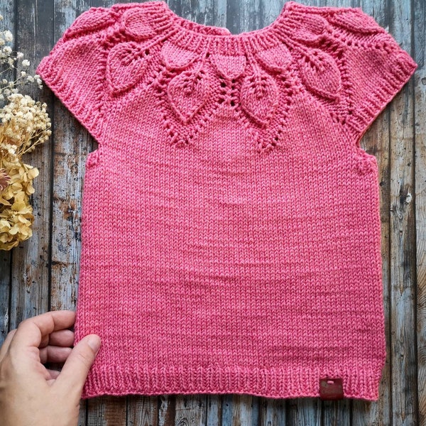 Gestrickte Weste für Mädchen. Wollpullover für Babys. Baumwolloberteil für Mädchen