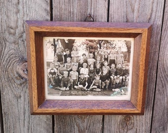 ancienne photo de groupe dans un cadre en bois étudiants