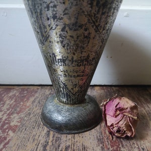 ancient measuring cup Patina
