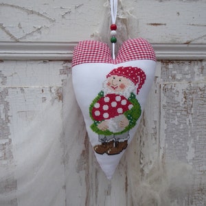 Decorative heart, garden gnome