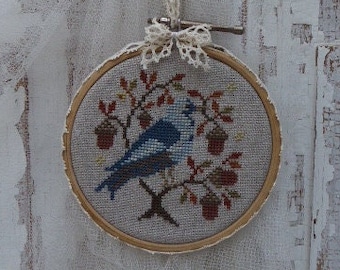 Image de broderie, oiseau brodé en anneau de broderie