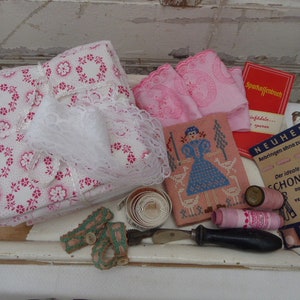 Antique sewing package, pink-white