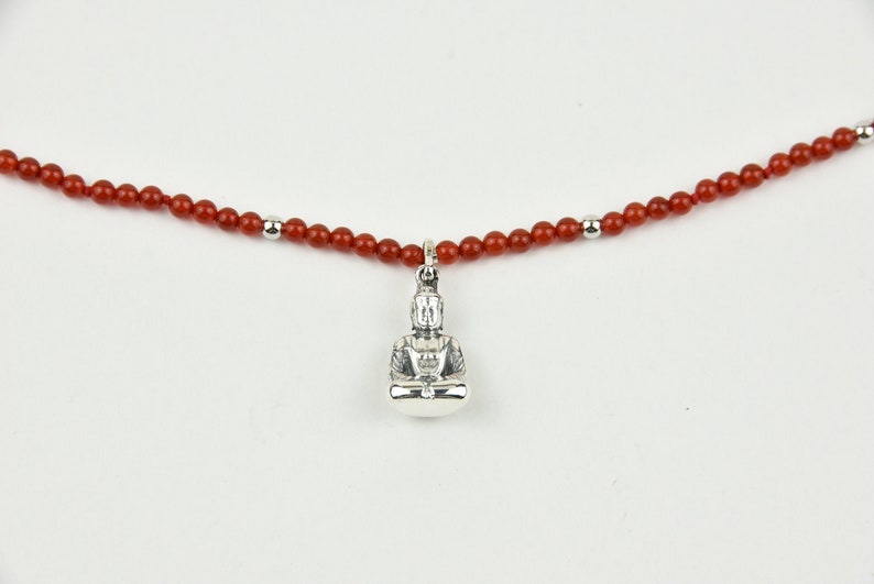 Buddha necklace a la crime detective in carnelian image 1