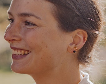 Small earcuff with garnet pendant