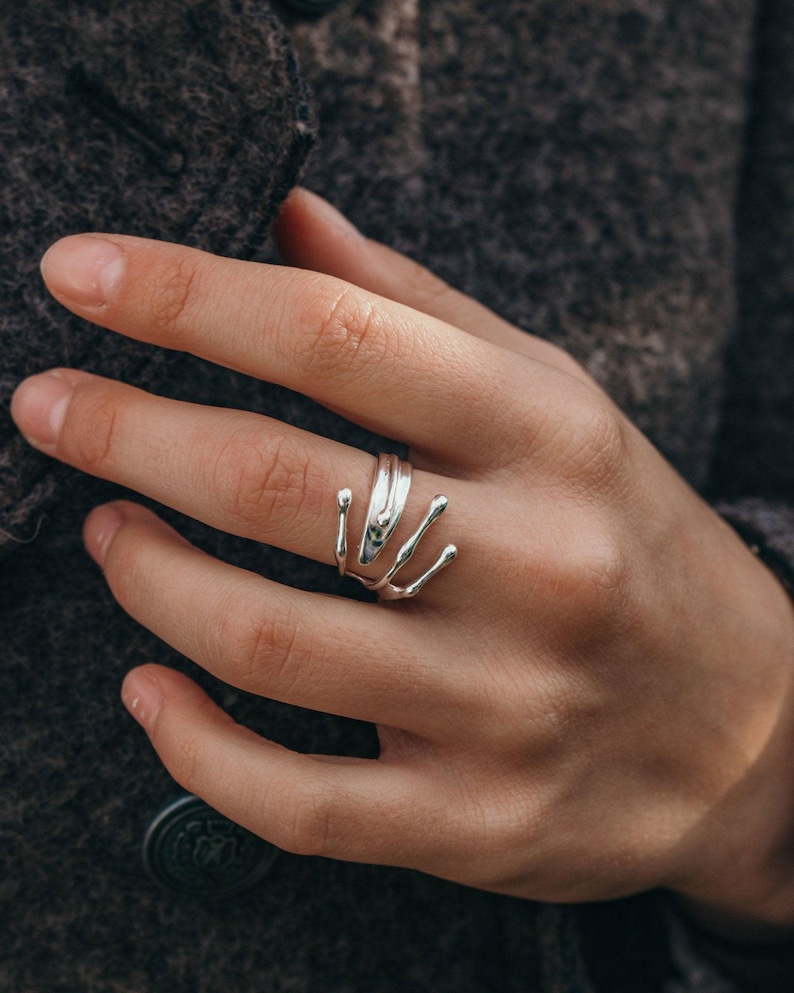 verspielter ring in gold