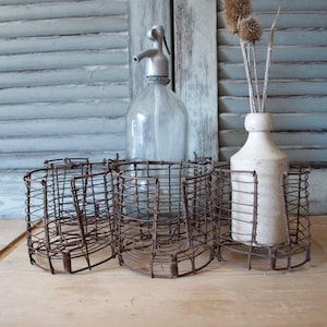 Old bottle holder, bottle basket, fil de fer, rust, wire, antique, vintage, brocante