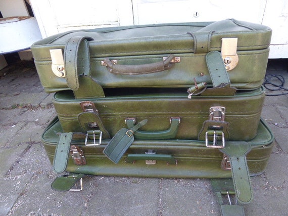 3 x green 70s suitcase