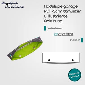 Puede incluir: Un patrón de costura PDF para una caja de almacenamiento de agujas. El patrón incluye instrucciones y una plantilla para una caja que mide 21,2 por 5,5 pulgadas. La imagen muestra una caja terminada con un forro verde y una tela negra y blanca con estrellas.