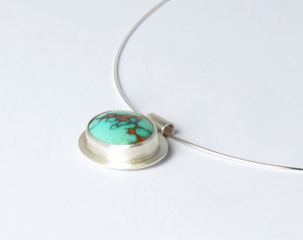 Oval pendant with turquoise