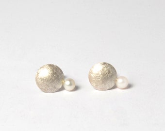 Silver stud earrings with pearl