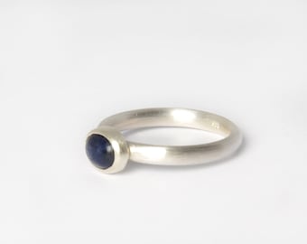 Silver ring with oval sodalite, midnight blue