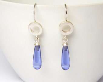 Long silver earrings with blue tanzanite pamphlets