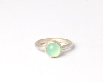 Silver ring with a round chalcedony