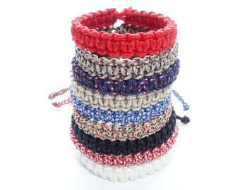 Mad Max style adjustable paracord survival bracelet.