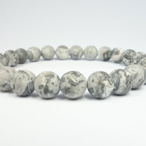Bracelet en perles pour homme. Bracelet extensible 8 mm en jaspe paysage gris mat. Bracelet en pierres précieuses pour homme. Cadeau bracelet pour homme et femme.