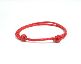 Red paracord masculine jewelry for men and women. Red string protection bracelet