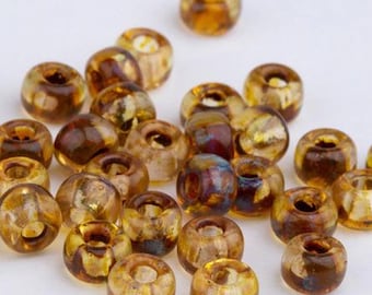 Miyuki 6/0 Seed Beads: Picasso Transparant Light Topaz, 10g